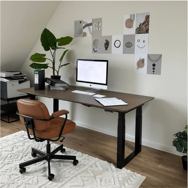 FlexiSpot E7Q Odin 4-leg electric height adjustable standing desk in a bright home office, shared by @olali1987